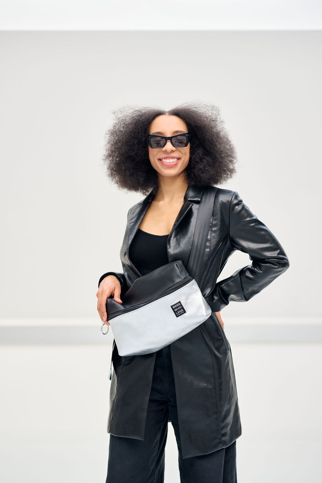 The Silver Box crossbody bag worn