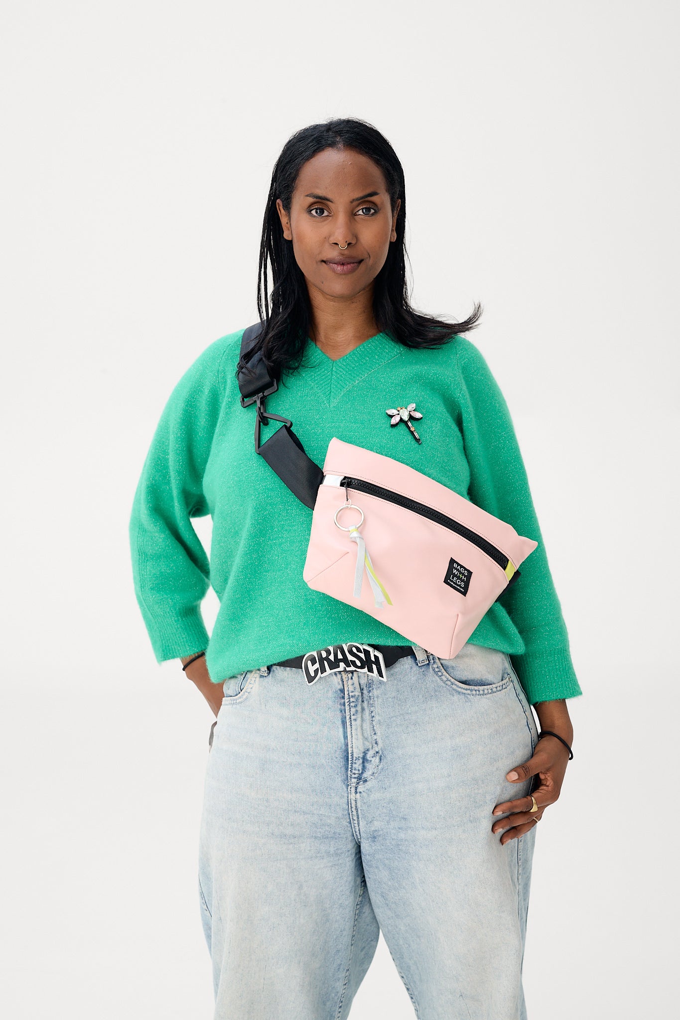 CREAM crossbody bag worn